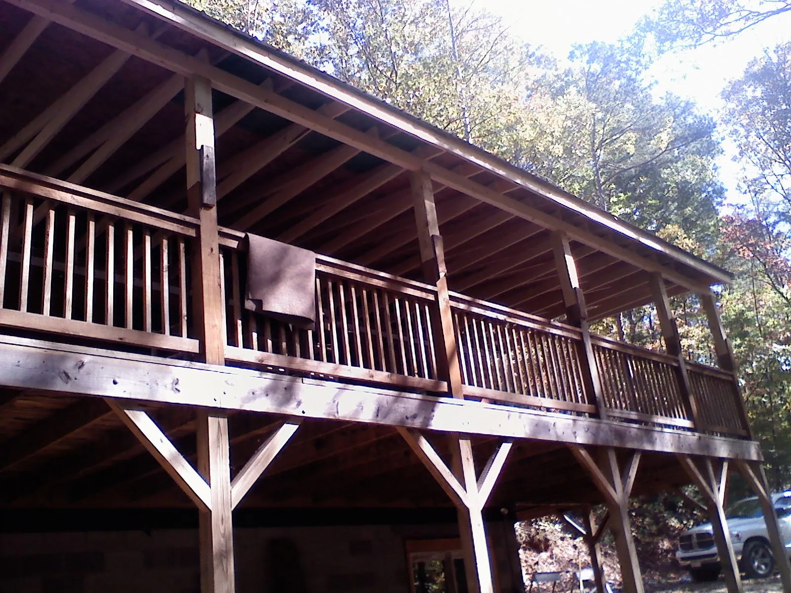 Timber framing under a new elevated porch and deck — Roof Leak Repair in Brave by Roofing Brothers